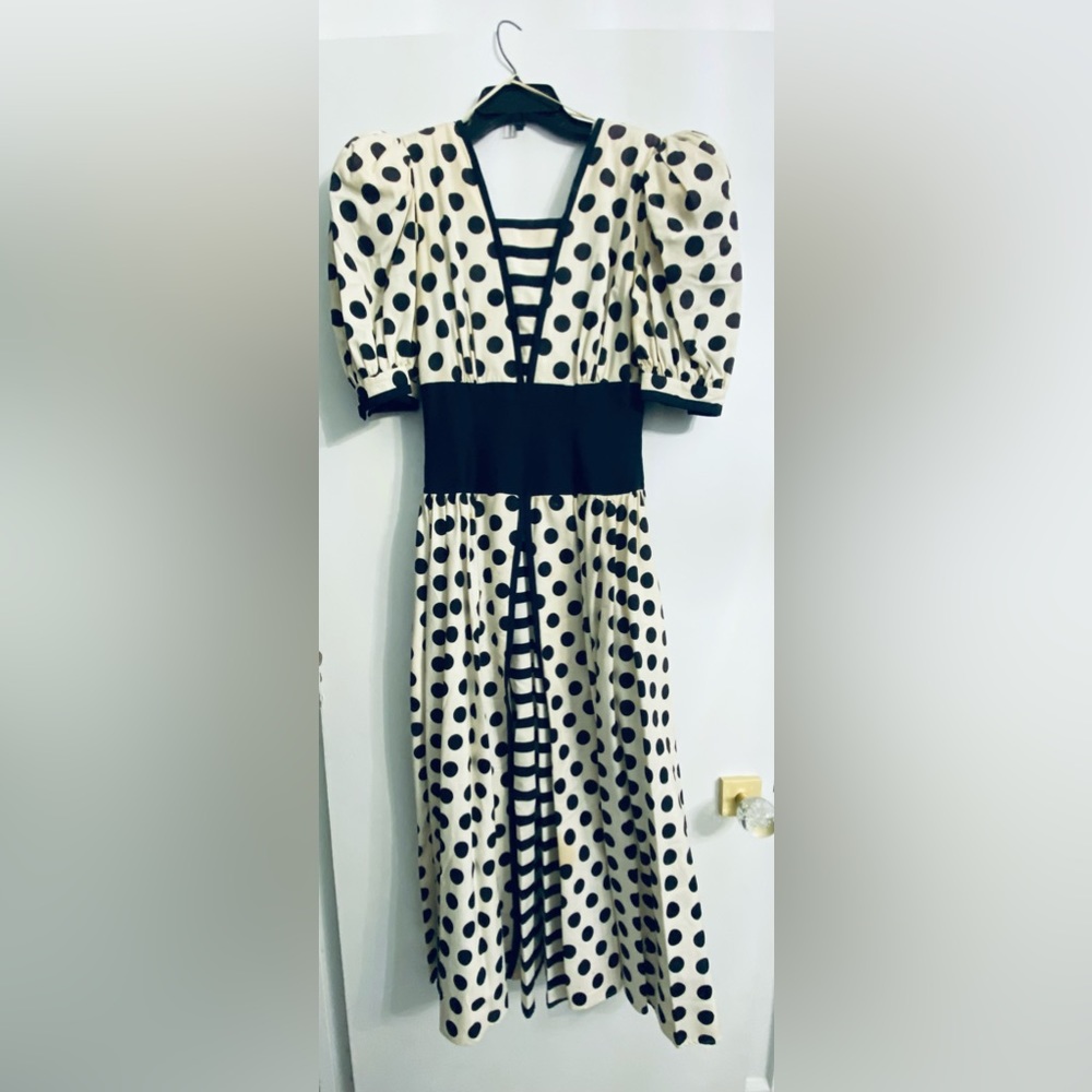 Vintage polka dot and striped dress with pockets.